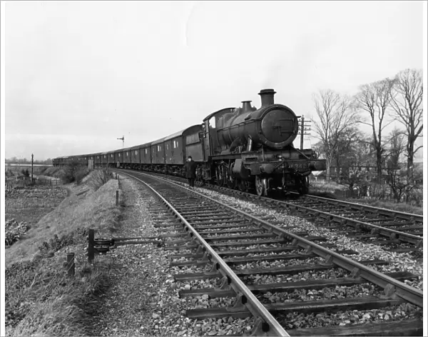 No 4342 carrying a train of car containers up to the Scottish Motor show, 1935