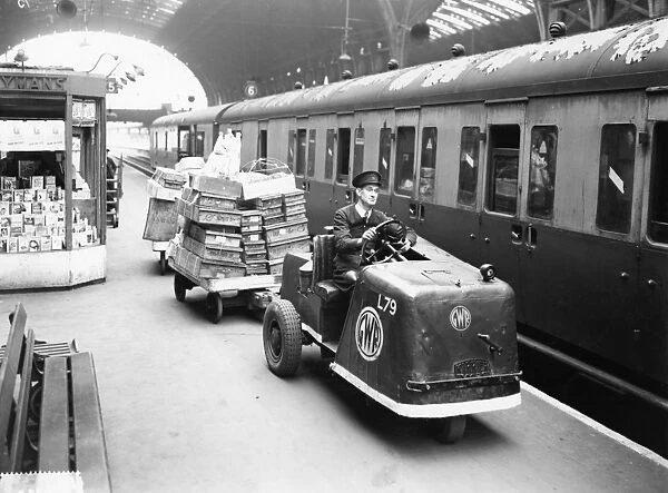 Petrol driven Karrier on Platform 5 at Paddington Station, c. 1935