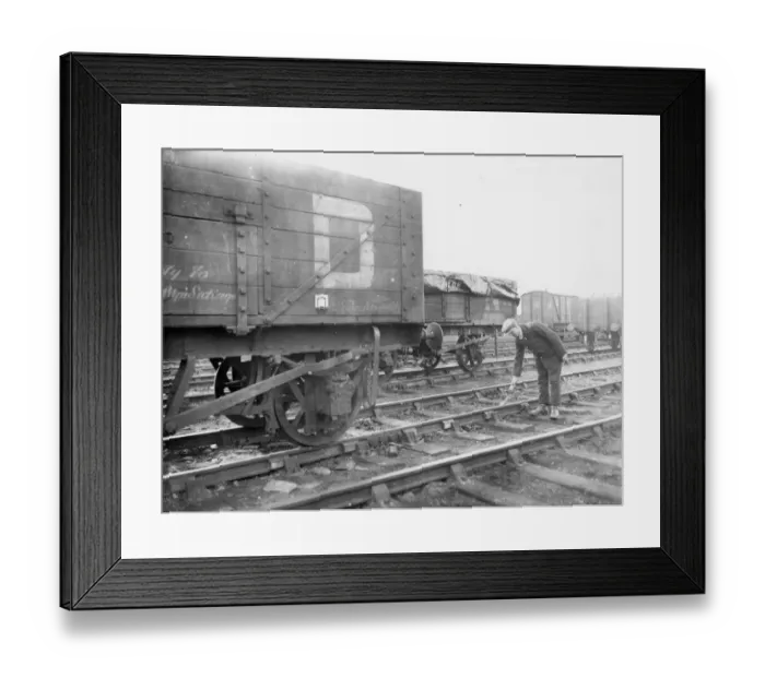 Framed Print : Goods shunter laying a skid in front of wagon, 1934 Framed Print : Goods shunter laying a skid in front of wagon, 1934