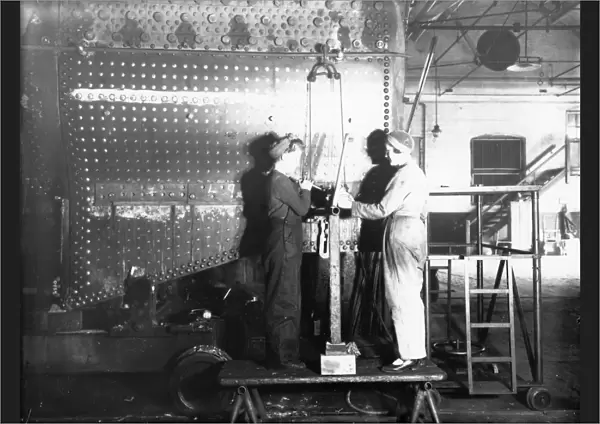 Women working on a locomotive boiler in Swindon Work during WW2