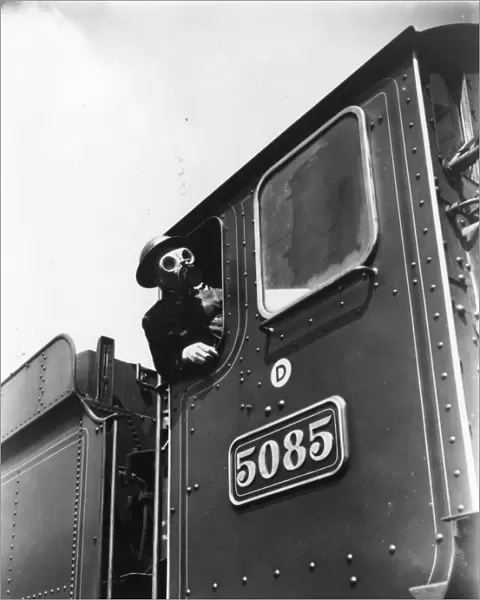 Locomotive driver in air raid kit, during WWII