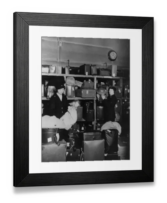 Framed Print : Women porters working in the left luggage office at Paddington station, during WWII