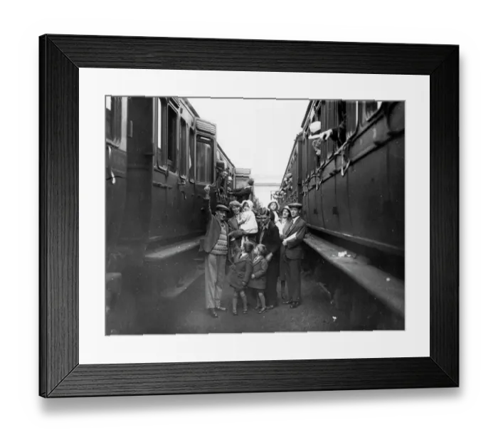 Framed Print : Family boarding a train in the carriage sidings at Swindon, for the annual Works trip, 1932
