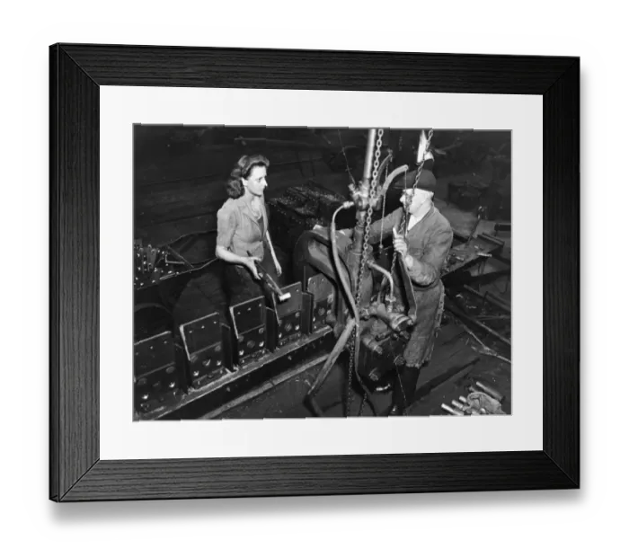 Framed Print : Female rivet hotter, A Shop, c. 1940 Framed Print : Female rivet hotter, A Shop, c. 1940