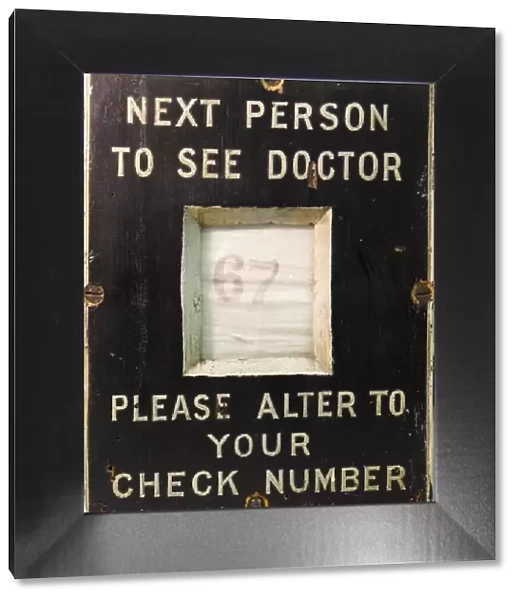 Patient number board from Swindon Medical Fund waiting room