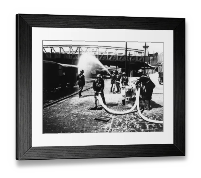 Framed Print : GWR fire brigade at Paddington Station taking part in a drill, c. 1940