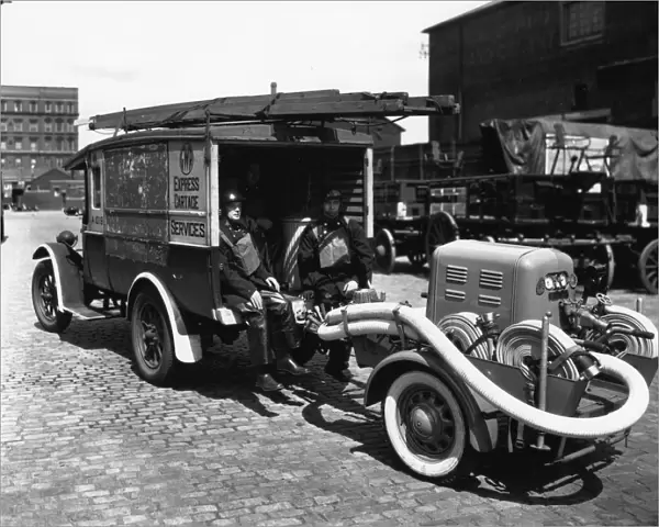 A petrol trailer fire pump hauled by an ex-GWR Express Cartage van, 1940