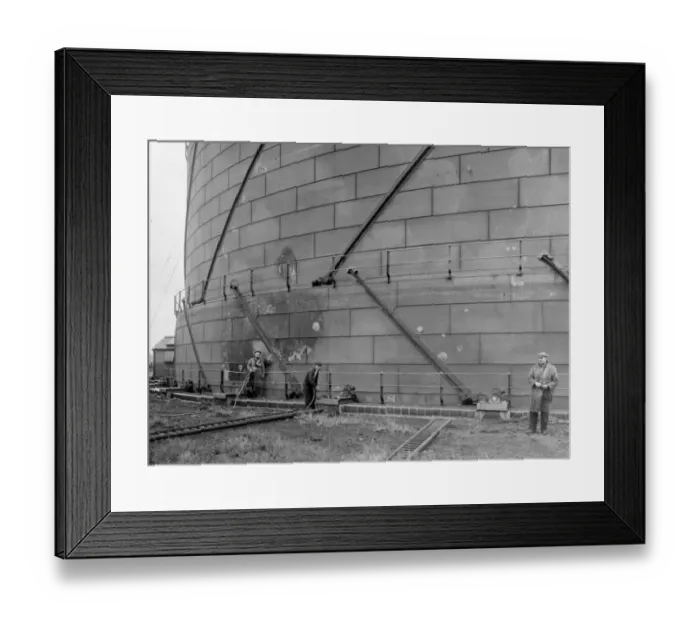 Framed Print : Air raid damage to the gas holder at Swindon Works, 1942 Framed Print : Air raid damage to the gas holder at Swindon Works, 1942