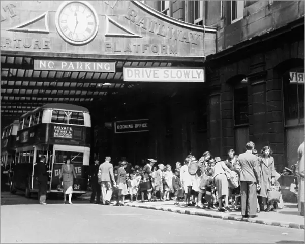 Evacuees waiting outside the departure platform at Paddington in 1939