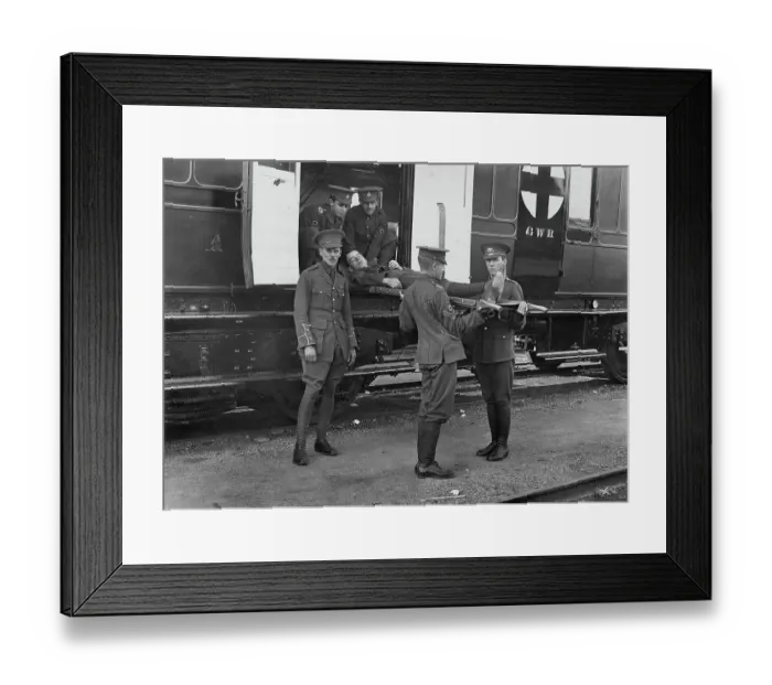 Framed Print : Casualty being taken taken from an ambulance carriage, 1914