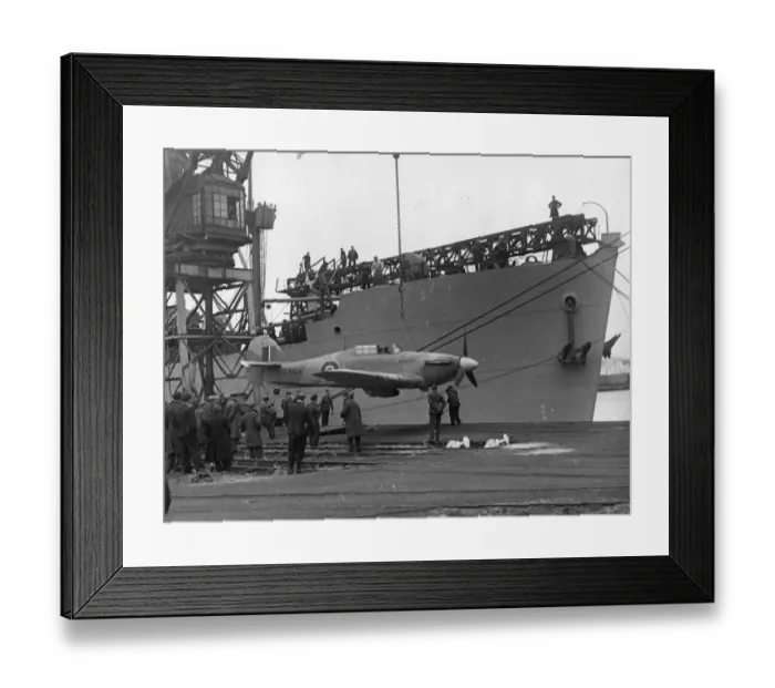 Framed Print : A Sea Hurricane being loaded onto an armed merchant ship at Cardiff docks, c. 1941 Framed Print : A Sea Hurricane being loaded onto an armed merchant ship at Cardiff docks, c. 1941