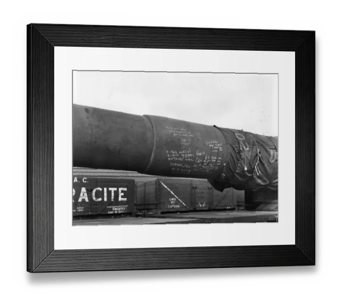 Framed Print : A 16 inch gun barrel loaded onto an eighteen wheel gun wagon in 1942