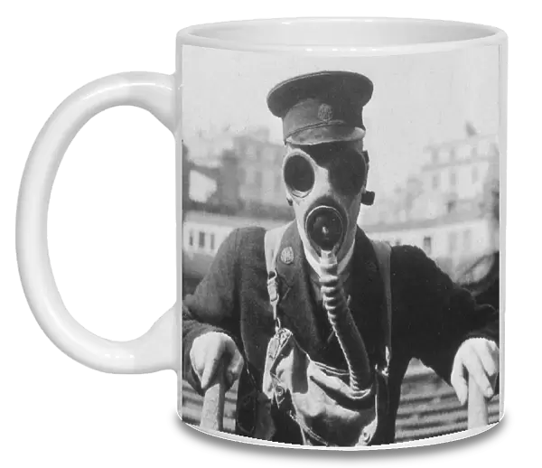 GWR station staff member in a gas mask, c. 1939