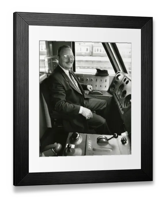 Framed Print : A driver at the controls of a diesel locomotive in about 1980