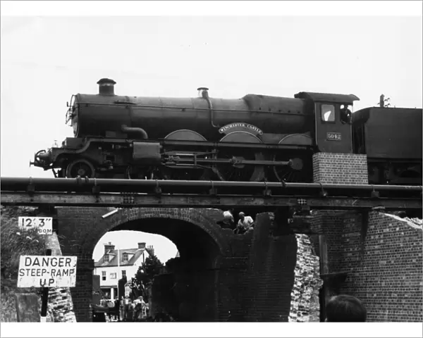 No 5042 Winchester Castle crossing Bruce Street bridges (during dismantling), Swindon, c1960