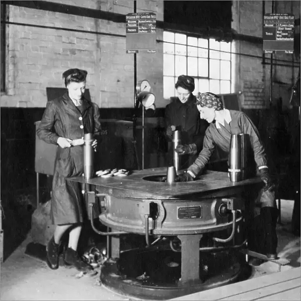 Women war workers making ammunition shells in 24F Shop, 1943