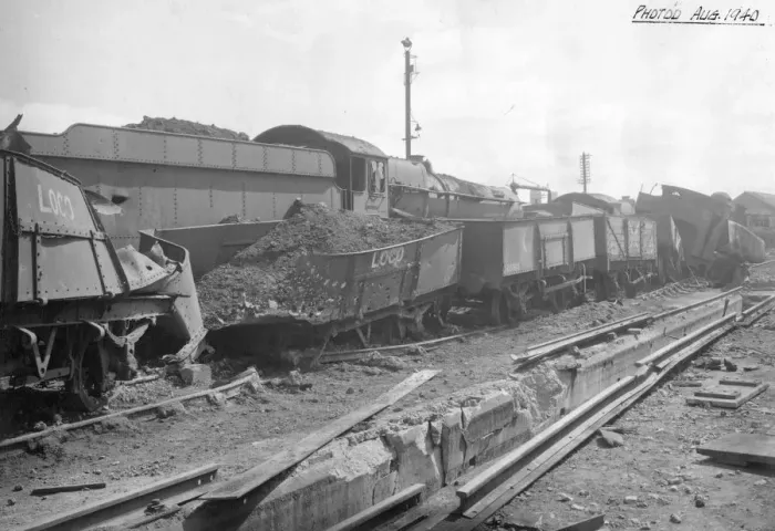 Framed Print : Air raid damage to goods wagons at Newton Abbot Station in 1940 Framed Print : Air raid damage to goods wagons at Newton Abbot Station in 1940