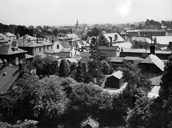 Chippenham, c.1930. A view looking south east over the market town of Chippenham, probably
