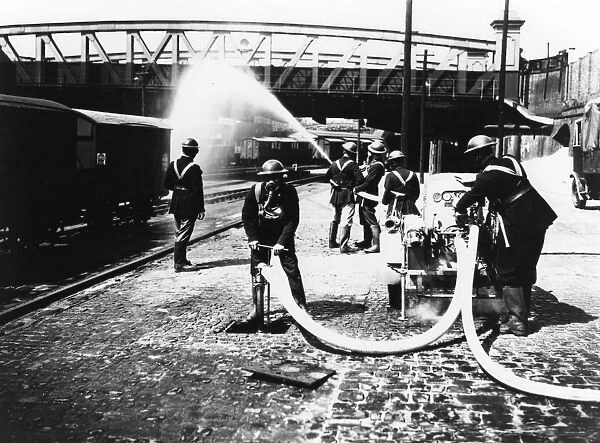 GWR fire brigade at Paddington Station taking part in a drill, c.1940