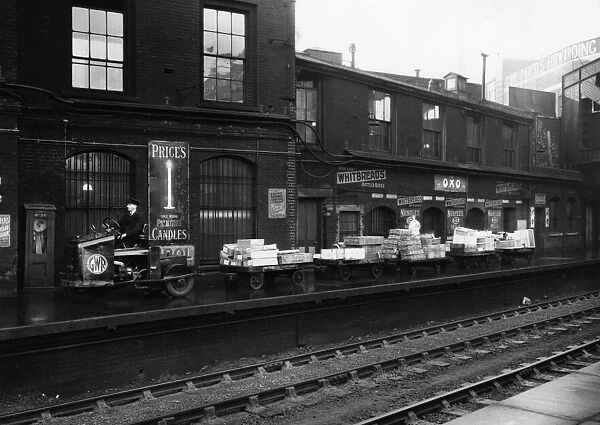 GWR Tractor and trollies on Paddington Station, c1936