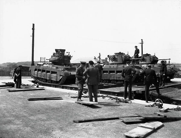 Tanks being loaded onto Rectank flat wagons, c.1940