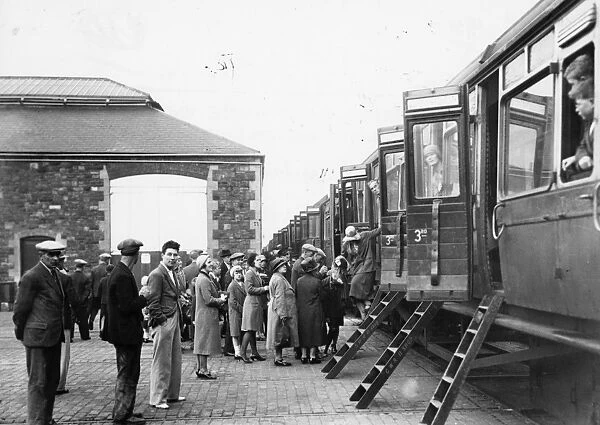 Trip, 1931. GWR families wait in line to board the trains for Trip week