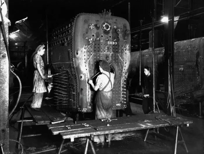 Framed Print : Workers riveting a locomotive boiler in V Boiler Shop c. 1942