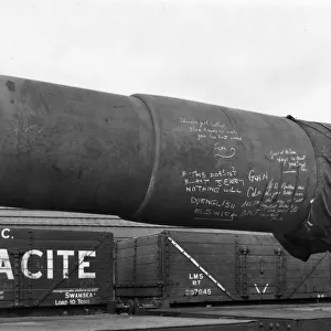 A 16 inch gun barrel loaded onto an eighteen wheel gun wagon in 1942