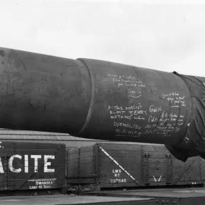 A 16 inch gun barrel loaded onto an eighteen wheel gun wagon in 1942