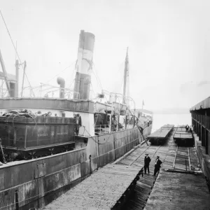 Unloading the tender of King George V from the ship at Baltimore, 1927