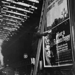 Woman pasting a billboard poster at Paddington station, 1943 Woman pasting a billboard poster at Paddington station, 1943