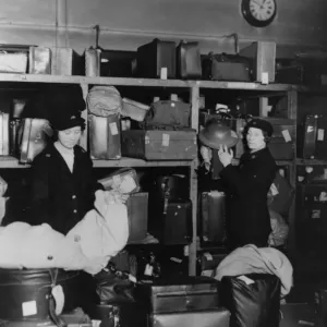 Women porters working in the left luggage office at Paddington station, during WWII Women porters working in the left luggage office at Paddington station, during WWII