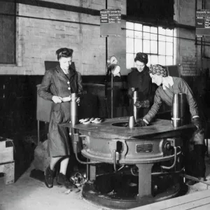 Women war workers making ammunition shells in 24F Shop, 1943