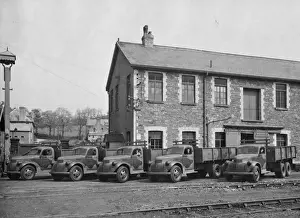The Railway At War Prints: Chevrolet Thornton military trucks lined up at Caerphilly Works, 1941