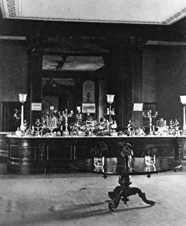 Prints of A view of the serving counter packed full of cakes, biscuits and fruit. The first class rooms were ornate and plush Wiltshire Stations Prints: First Class Refreshment Room, Swindon Junction Station, c. 1910