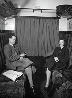 People/passengers/publicity shot couple carriage 1930s