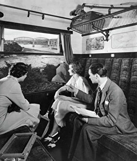 Passengers Gallery: Publicity shot of passengers in carriage, 1930s