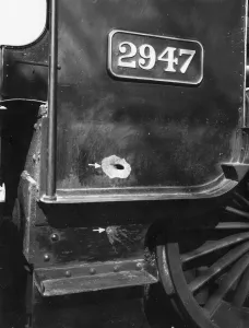 The Railway At War Prints: Saint Class locomotive, 2947 Madresfield Court with gun fire damage, c. 1940