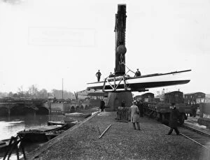 Transferring a boat from river to rail at the GWR Brent Docks, c1930s