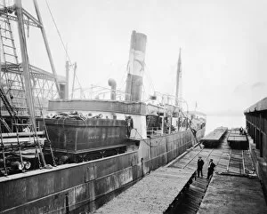 Other Docks Gallery: Unloading the tender of King George V from the ship at Baltimore, 1927