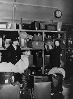 Female Collection: Women porters working in the left luggage office at Paddington station, during WWII