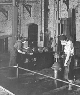 Swindon Works Gallery: Women war workers stamping ammunition shells in B Shop, 1942